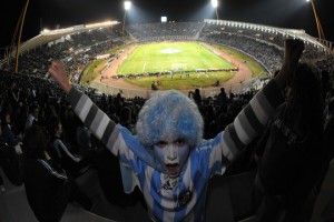 Wearing the local team colors and having a flag may help you mingle to the other supporters, but truly learning the chants is the right way for success at the football matches in Buenos Aires! / source